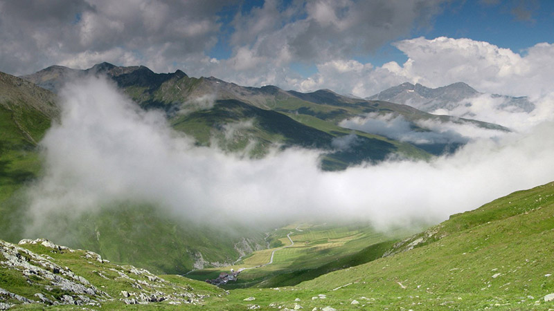 above clouds in Juf, the highest village of Switzerland