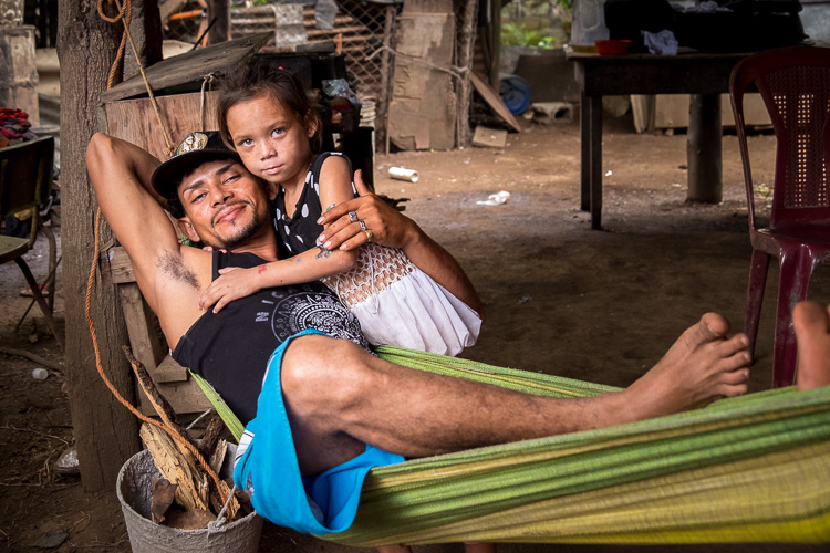 a tender moment between father and daughter in Nicaragua