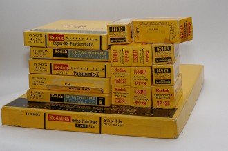 pile of old kodak film boxes