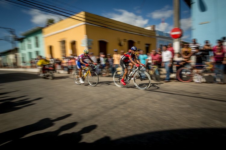 panning example of cyclists in Trinidad Cuba