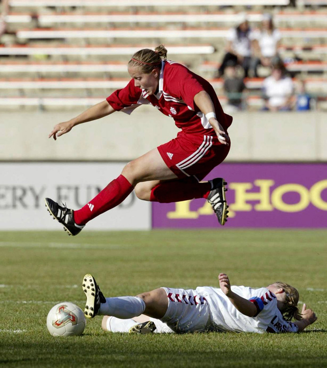 Soccer player is captured motionless by using a high shutter speed