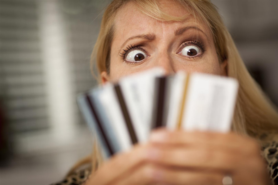 Upset Robed Woman Glaring At Her Many Credit Cards. by Colyer Law Group,  PC Tinley Park on 500px.com