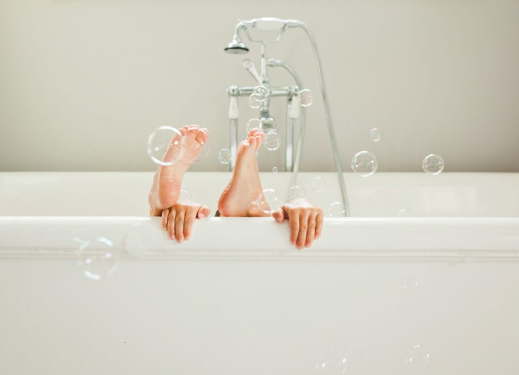 child's feet with bubbles