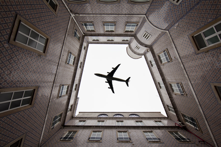 an airplane on the roof by Daniel Antunes on 500px.com