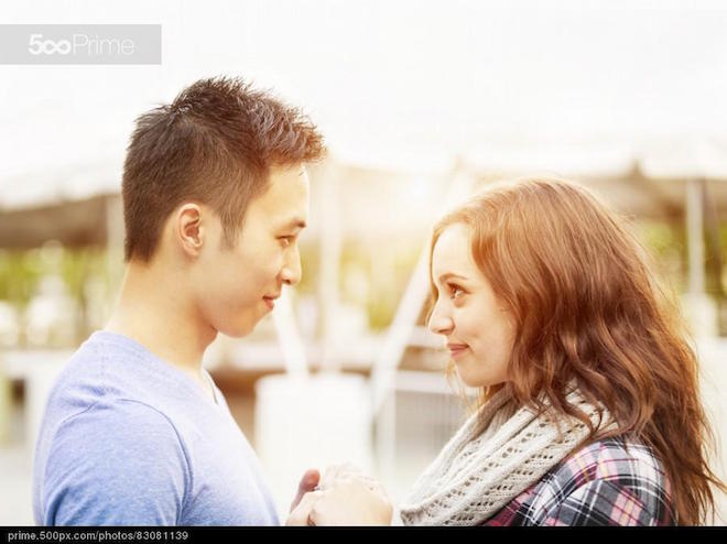 Young couple affectionately facing each other