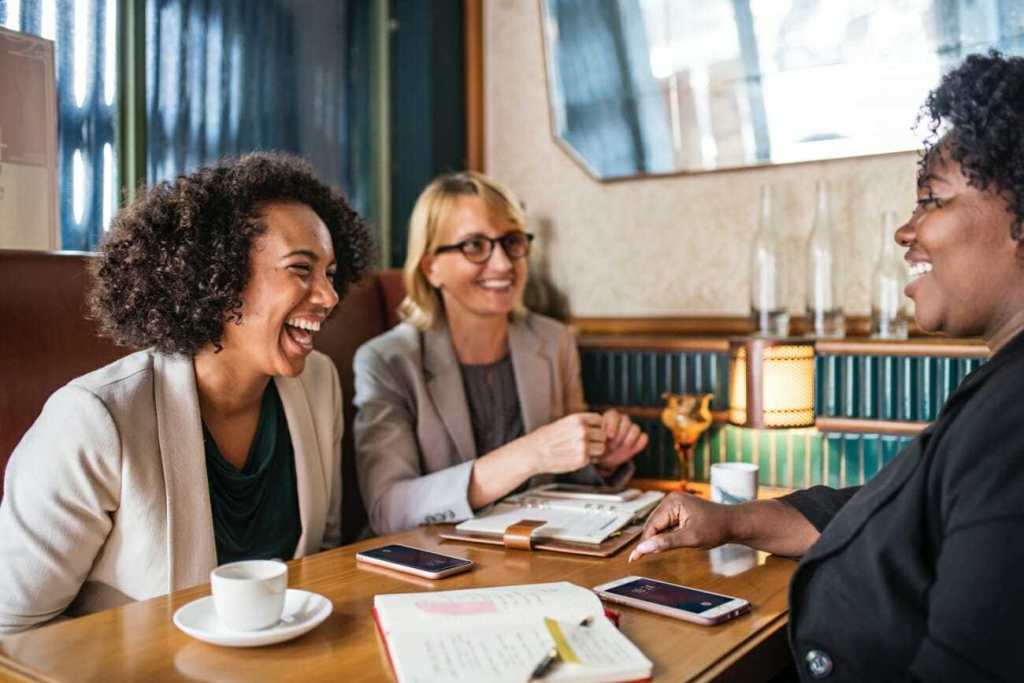 photographers networking at a table