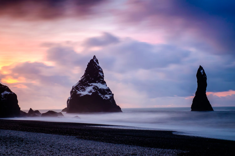 a long exposure technique to smooth water of the beach at Reynisfjara Iceland