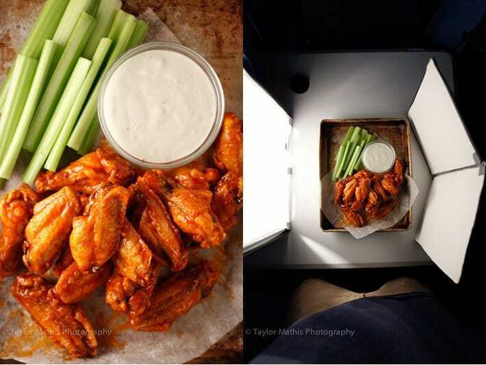 A plate of chicken wings being lit by a softbox and a reflector