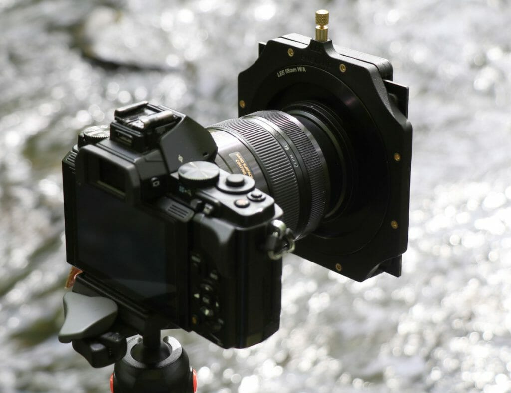 An ND filter attached to a DSLR camera lens