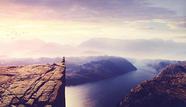 Create a Photo Manipulation of a Woman Watching a Sunrise Landscape