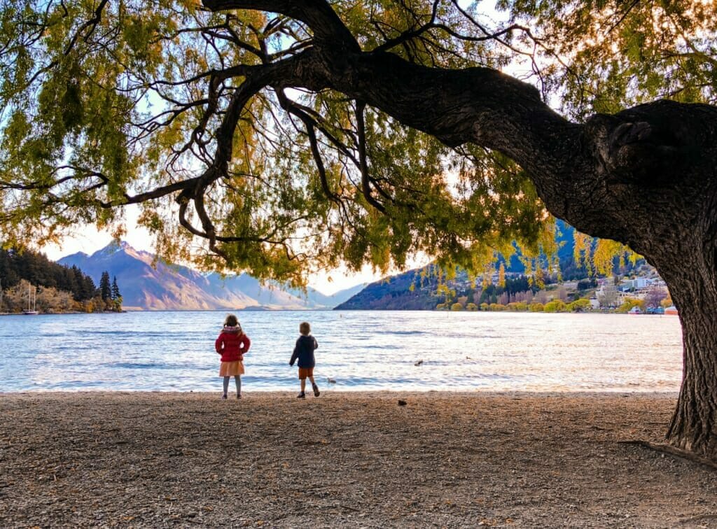 A HDR iPhone image of children looking out over a lake