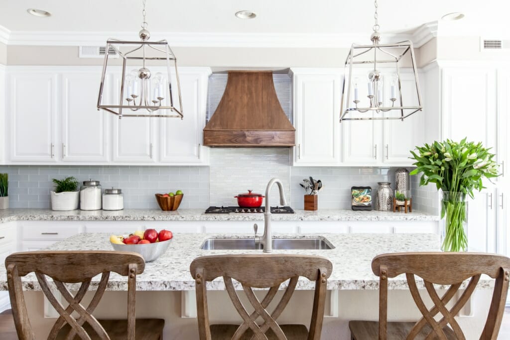 An interior photography image of a clutter-free white kitchen
