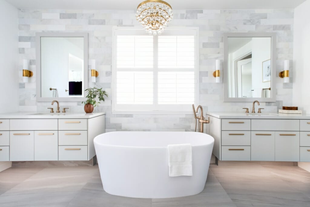 An interior photography image of the interior of a luxury white bathroom