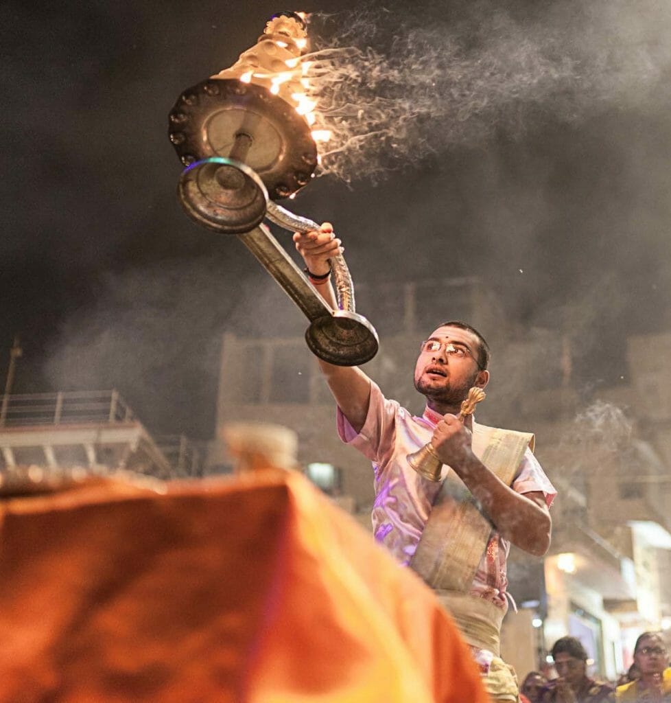 A man in India offers a fire to the deities 