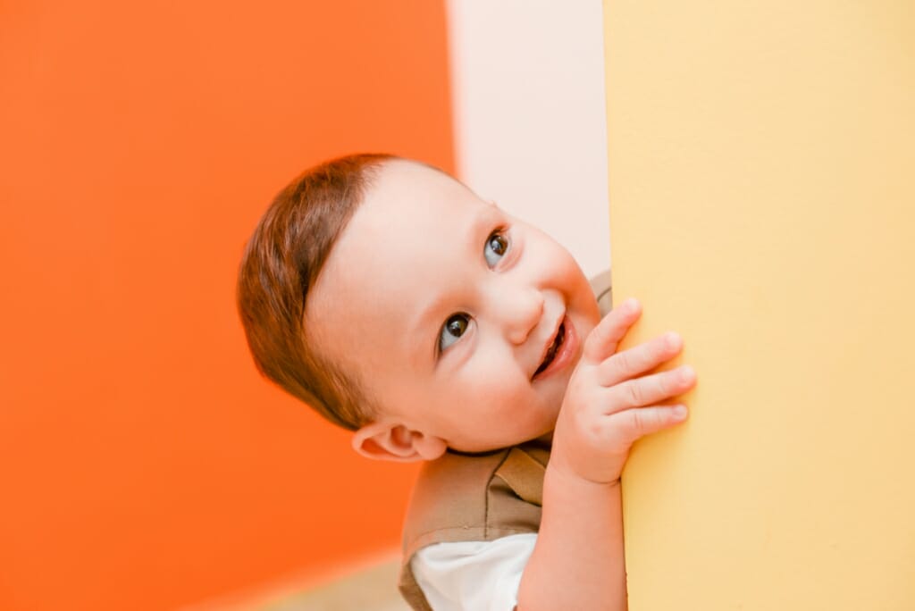 A boy looking up with focus on his eyes.