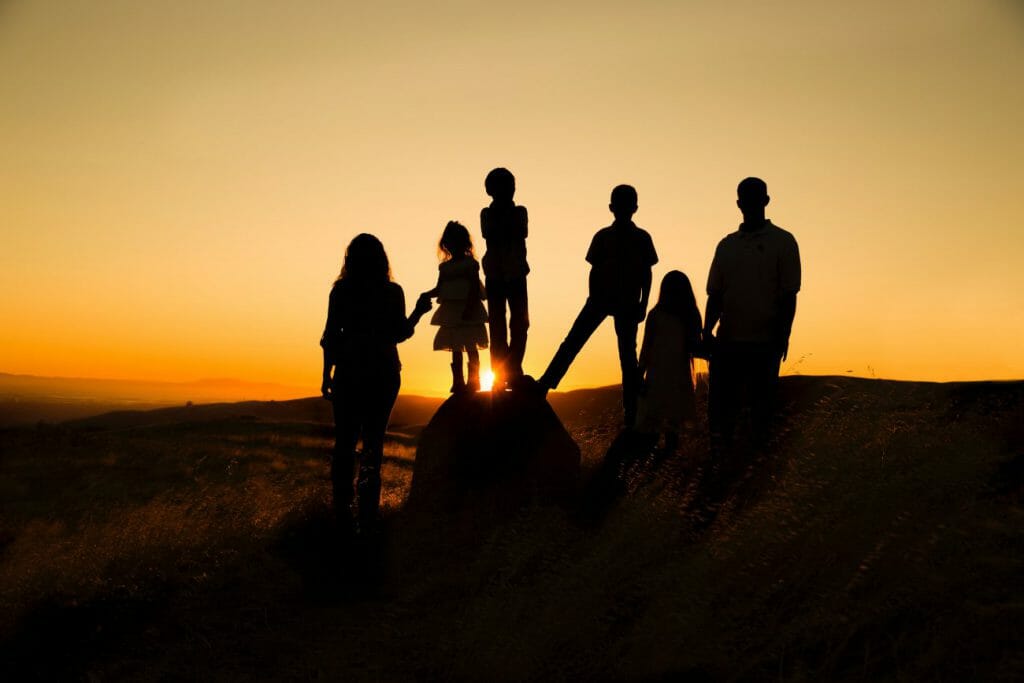 A family photography composed using the negative space rule