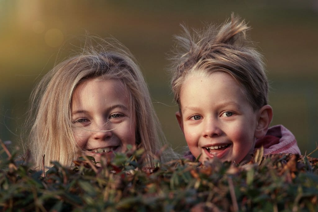 kids photography with a large aperture. Two children playing 