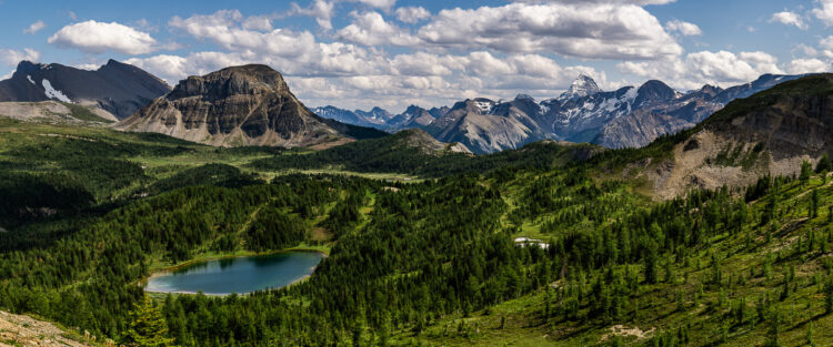 Panormaic photo of Mt Assiniboine mountain range makes for very creative mountain photography