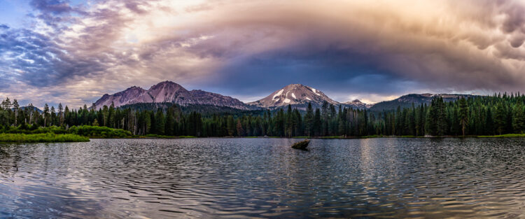 panoramic photo of a storm cloud over mount lassen for a creative mountain photo