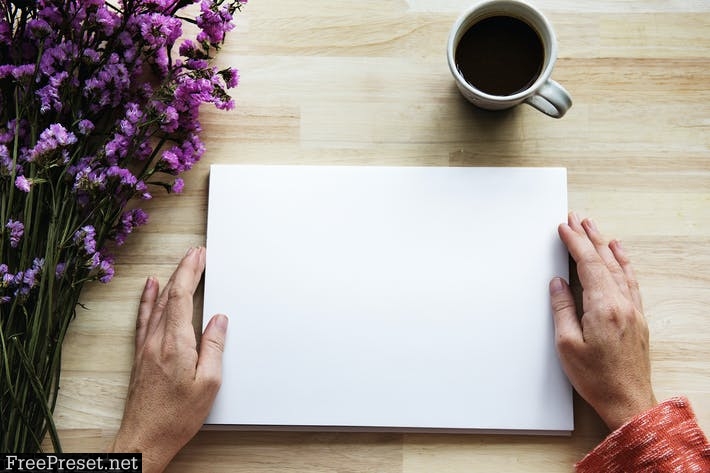 Blank Paper Mockup on Wooden Table