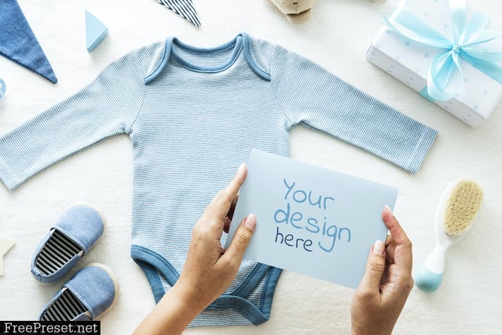 Flatlay of baby shower presents mockup VD9NC3