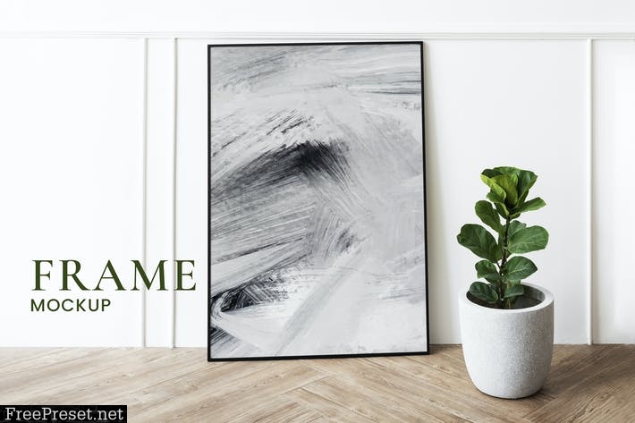 Picture frame mockup by a fiddle-leaf fig plant