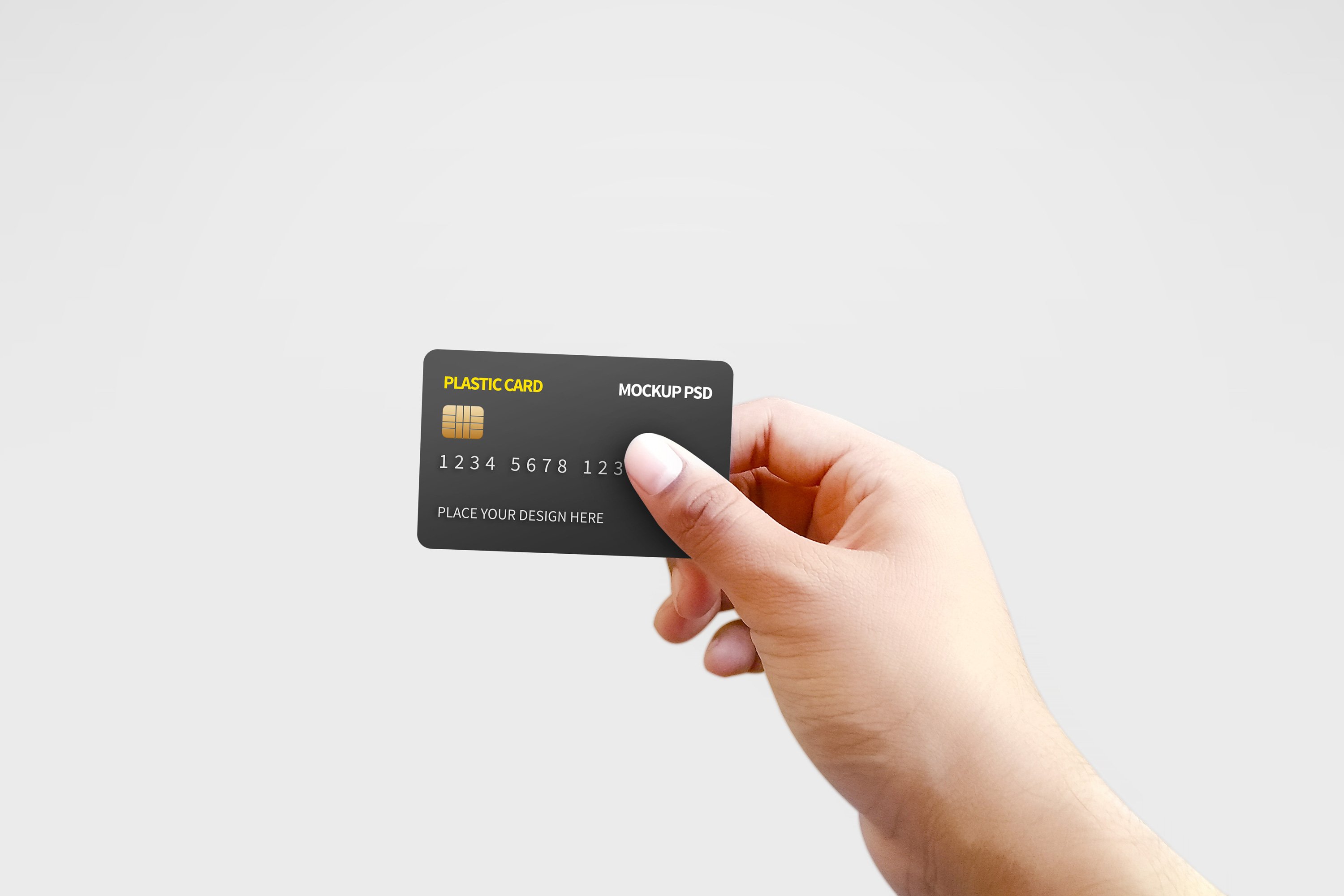 Chipped Plastic Card in Hand Mockup 5946311