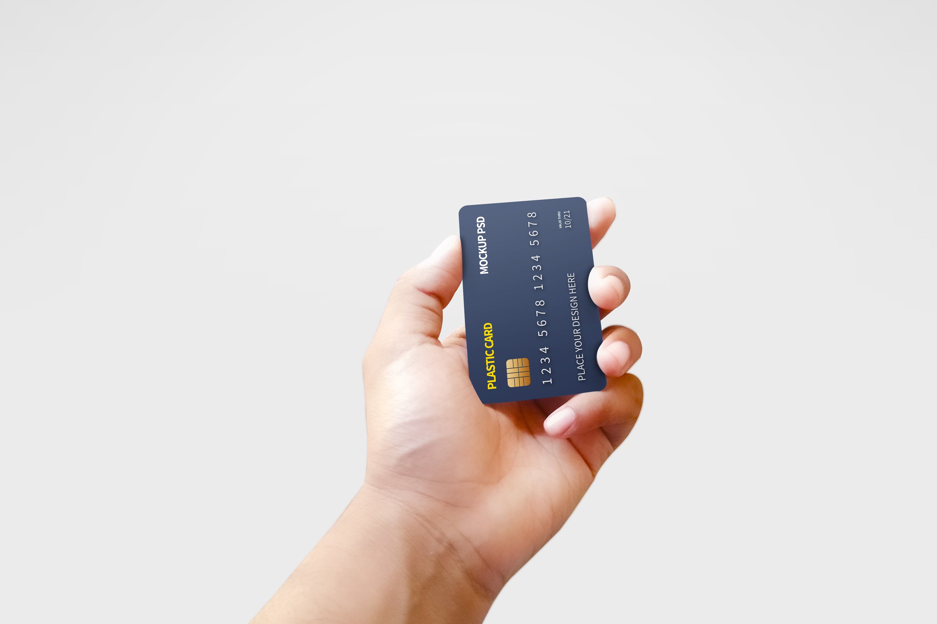 Chipped Plastic Card in Hand Mockup 5946311