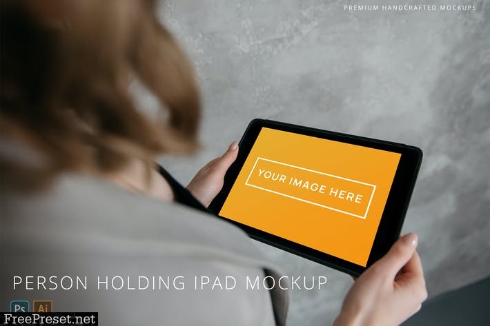 Person Holding iPad Photo Mockup Grey Background R83Z8YG