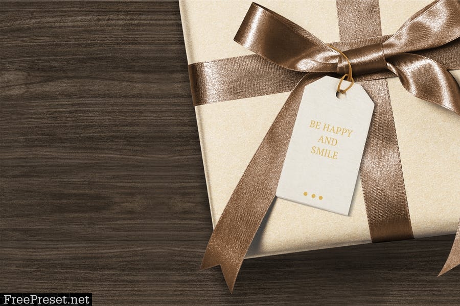 Present greeting tag mockup on a gift box Z2ASHGS