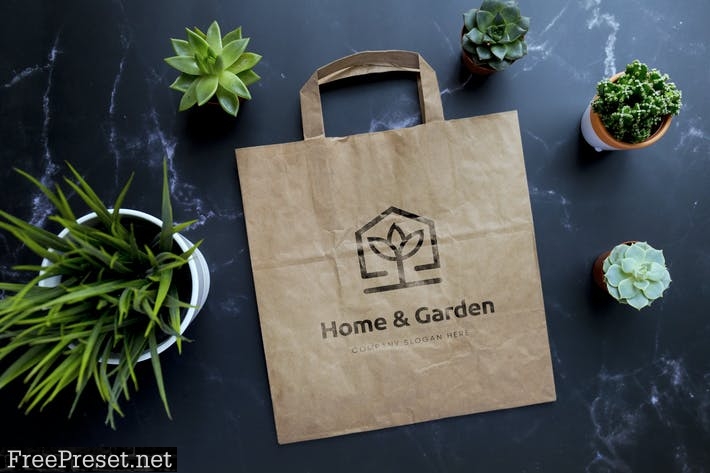 Paper kraft bag with plants mockup